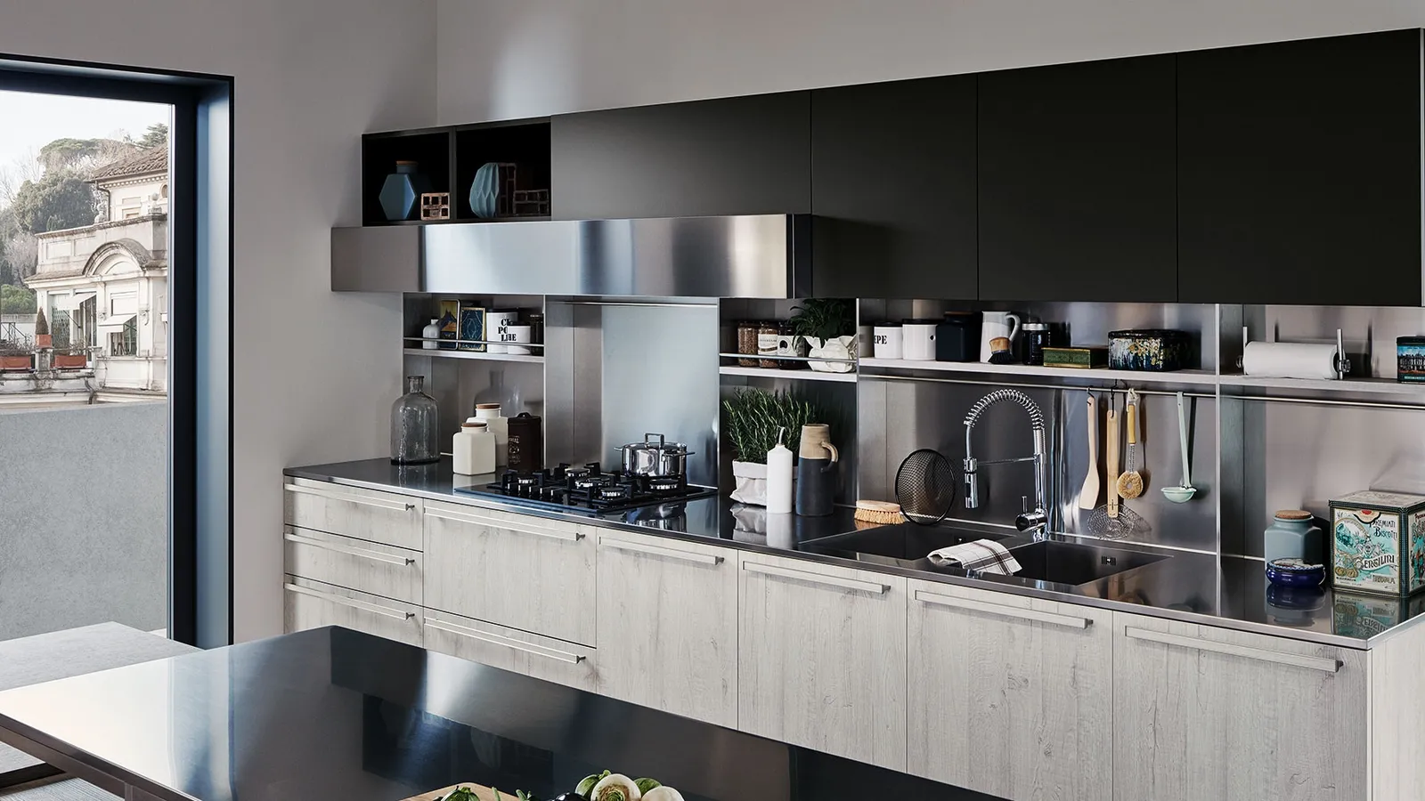 Cucina Moderna con penisola Ethica finitura Quercia Bianco Dek di Veneta Cucine